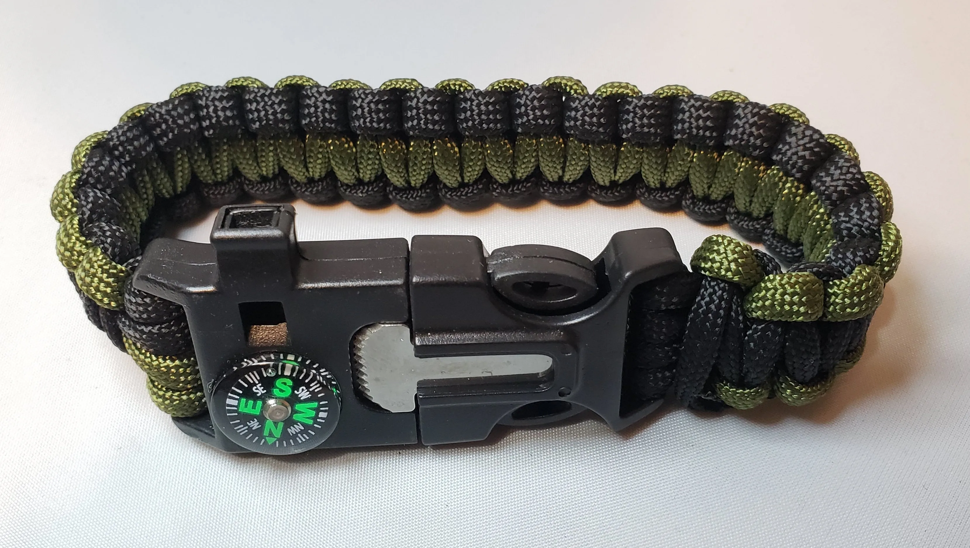 SURVIVAL BRACELET. 5 in 1 with Paracord, Compass, Fire Starter, Whistle & Scraper/Knife. 8.5" in various colors 