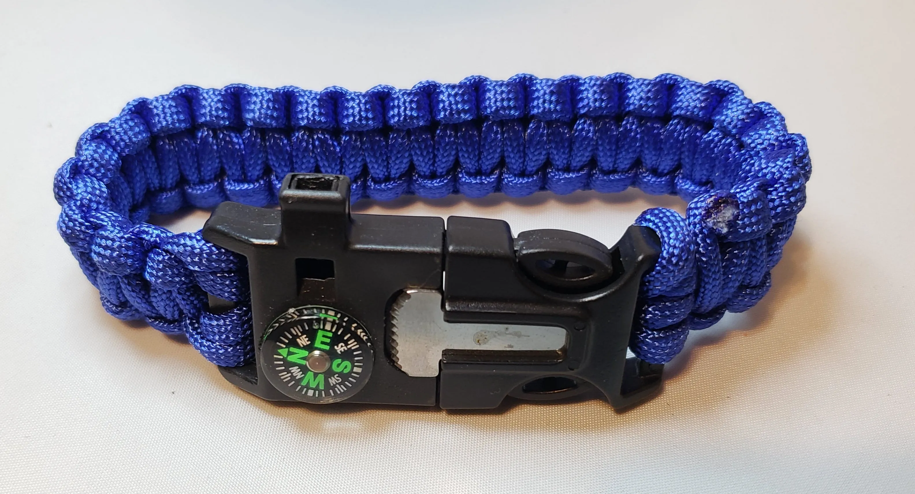 SURVIVAL BRACELET. 5 in 1 with Paracord, Compass, Fire Starter, Whistle & Scraper/Knife. 8.5" in various colors 